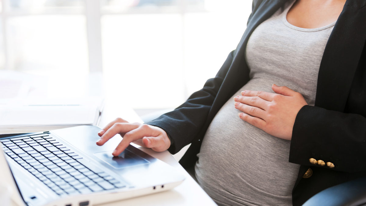 A woman happy with her pregnancy