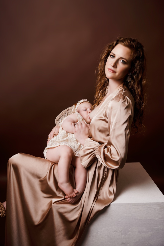 Mother Breastfeeding Her Daughter